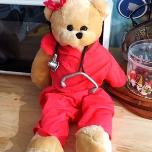 Brand: PBC InternationalPBC INTL Musical Nurse/Dr. 17" PlushPink Scrubs Bear
